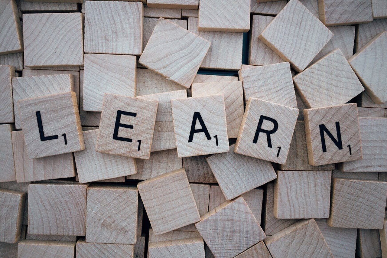 the word learn spelled in letters written on blocks